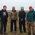 Hana standing with three women researchers in Alaska.